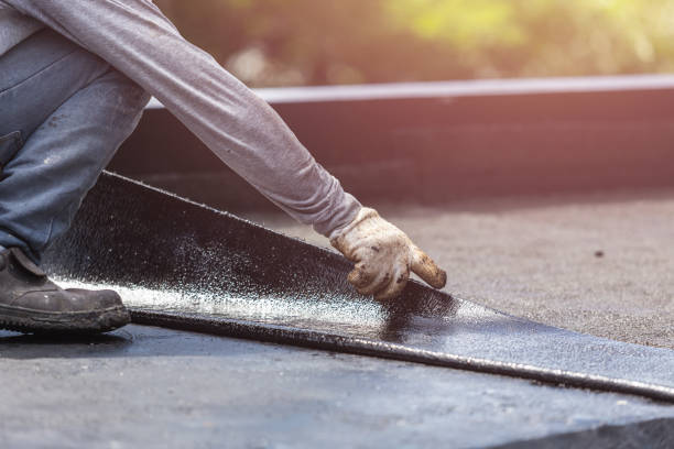 Professional Basement Waterproofing technician working in Brooksville, KY